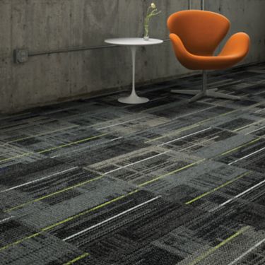 Interface AE312 carpet tile in open area with small table and chair image number 1