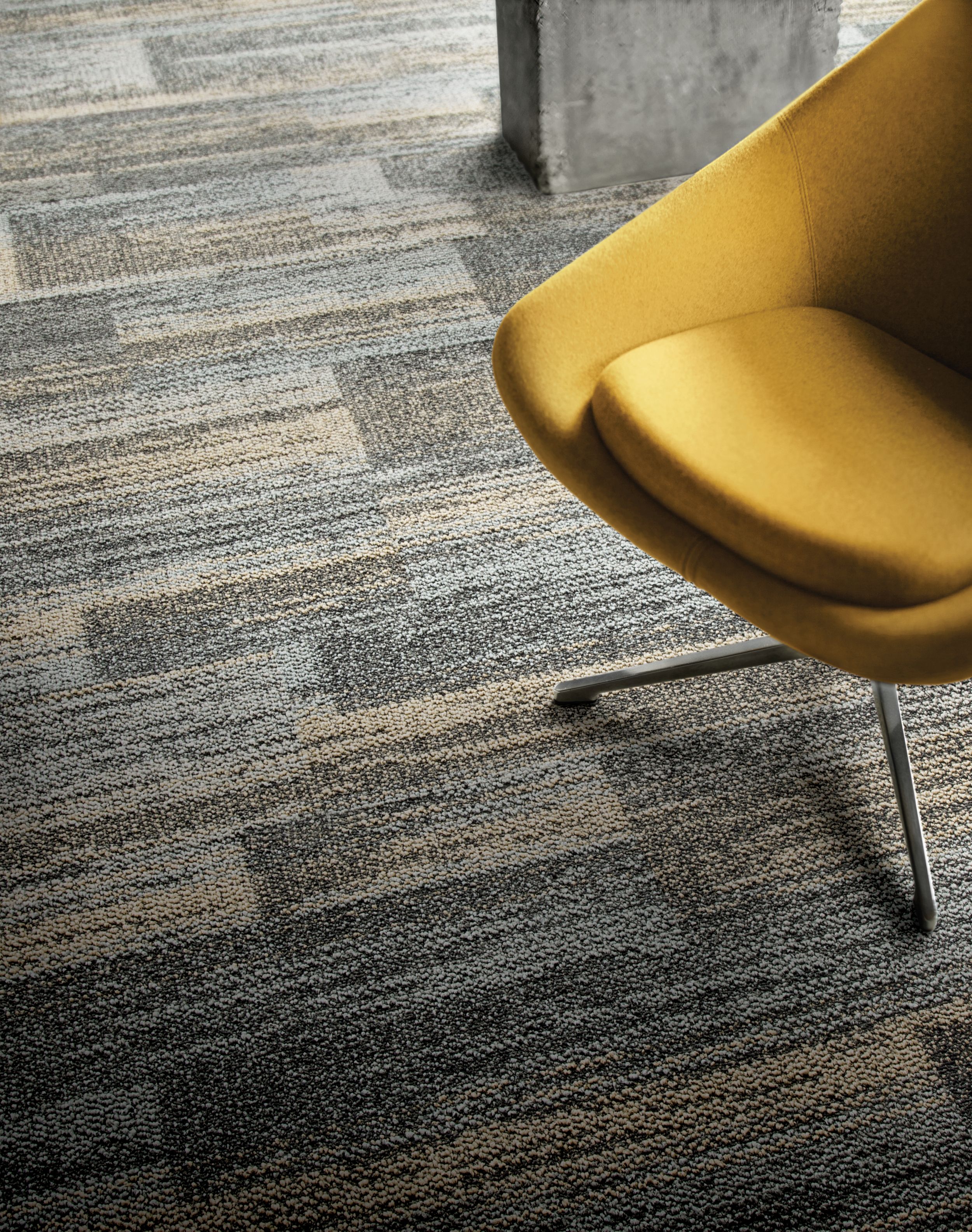 Close-up of Interface AE313 plank carpet tile with yellow chair image number 1