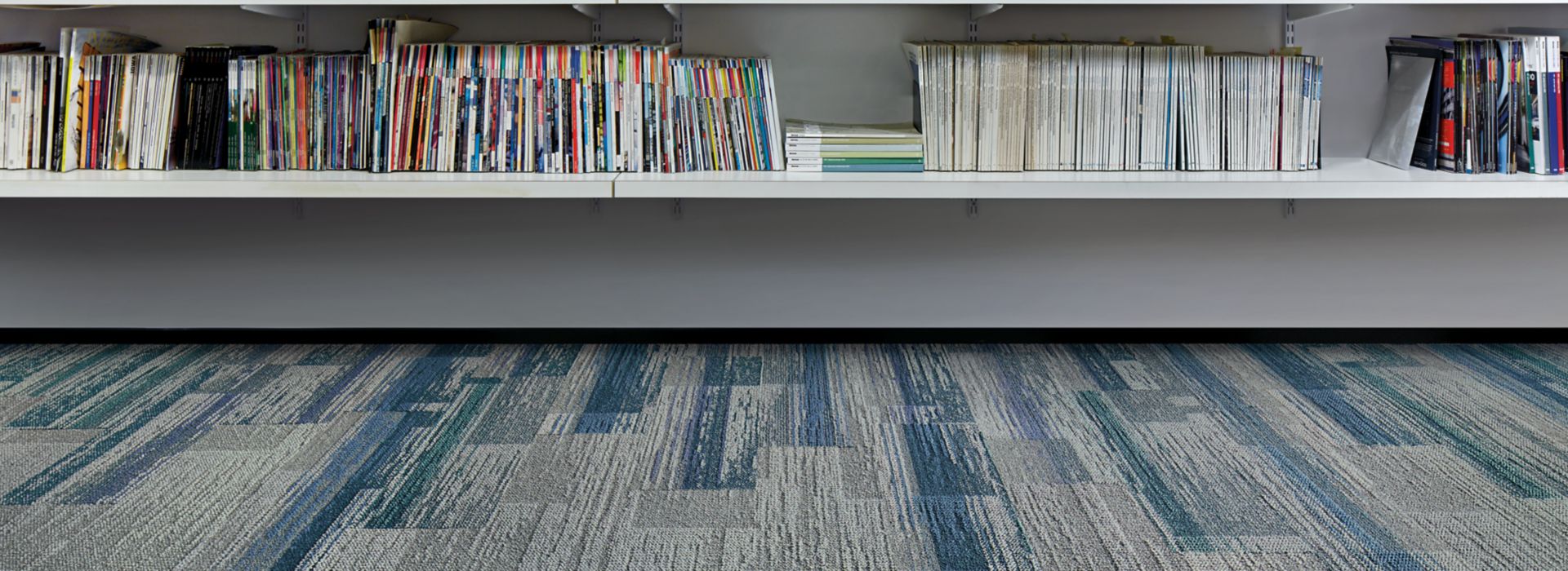Interface Aerial Flying Colors AE311 and AE315 plank carpet tile in library