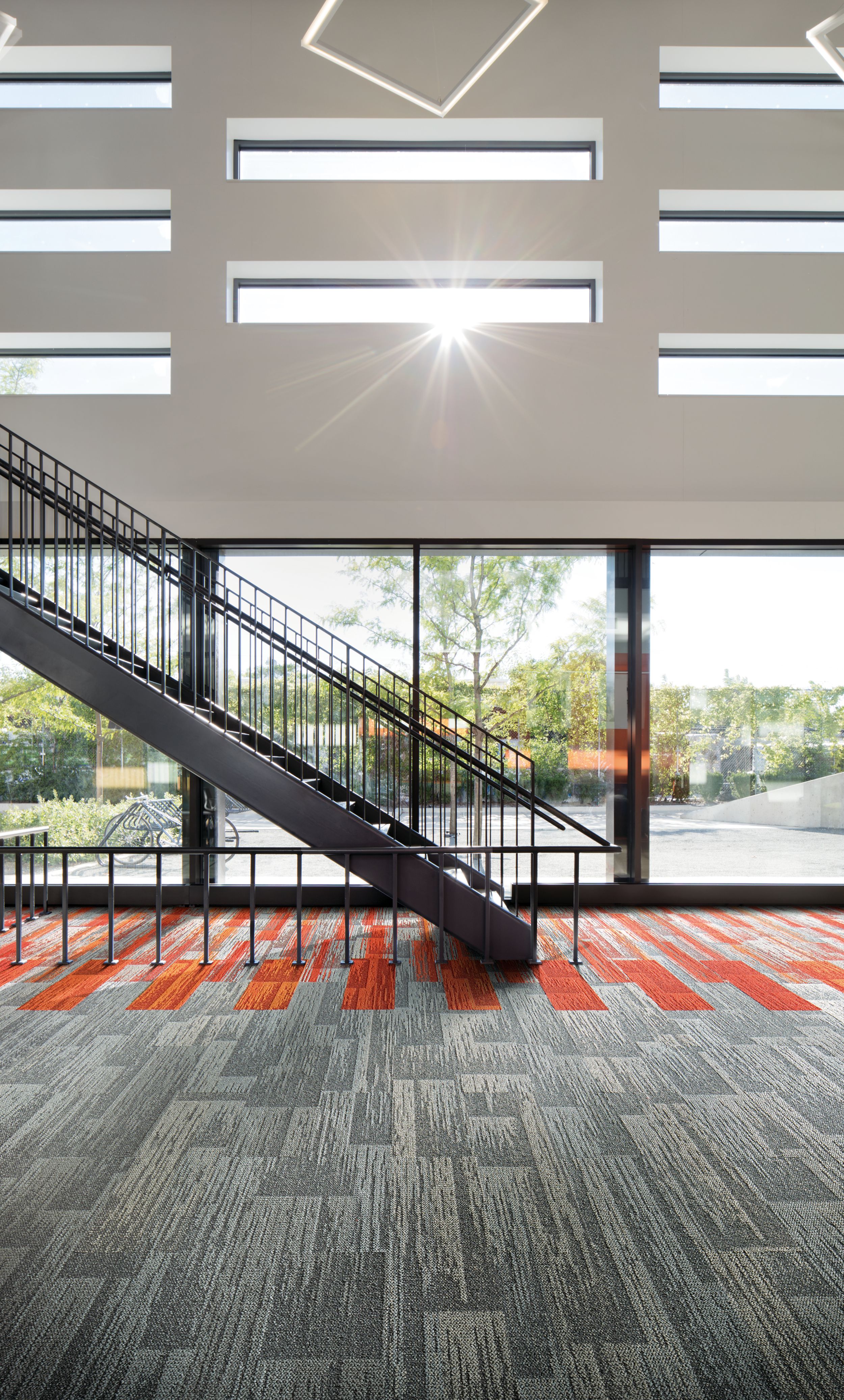 Interface Aerial Flying Colors AE311, AE315 and AE317 plank carpet tile in lobby with stairwell image number 8