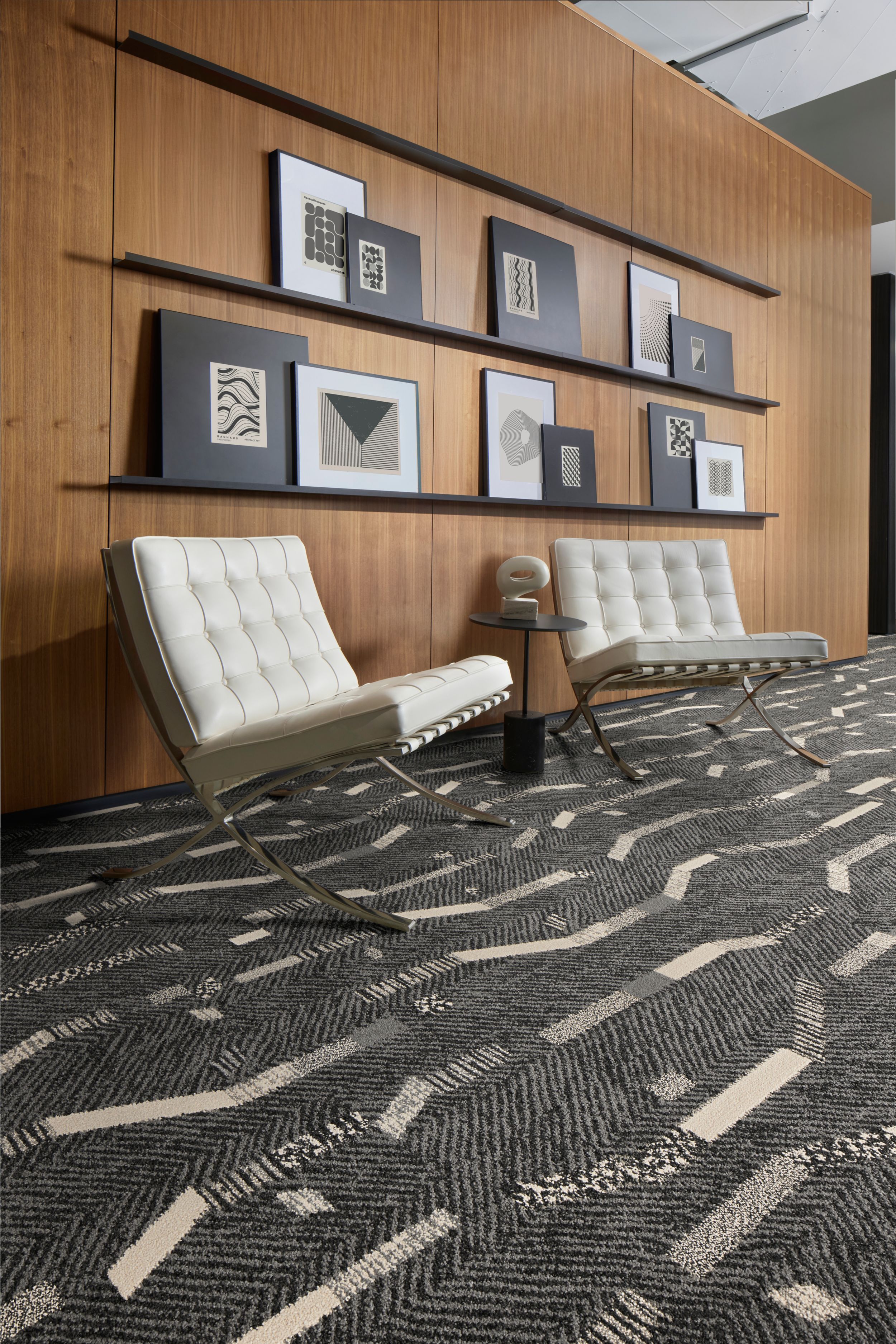 Interface Accent Hour plank carpet tile in workplace lobby with Knoll Barcelona chairs image number 2