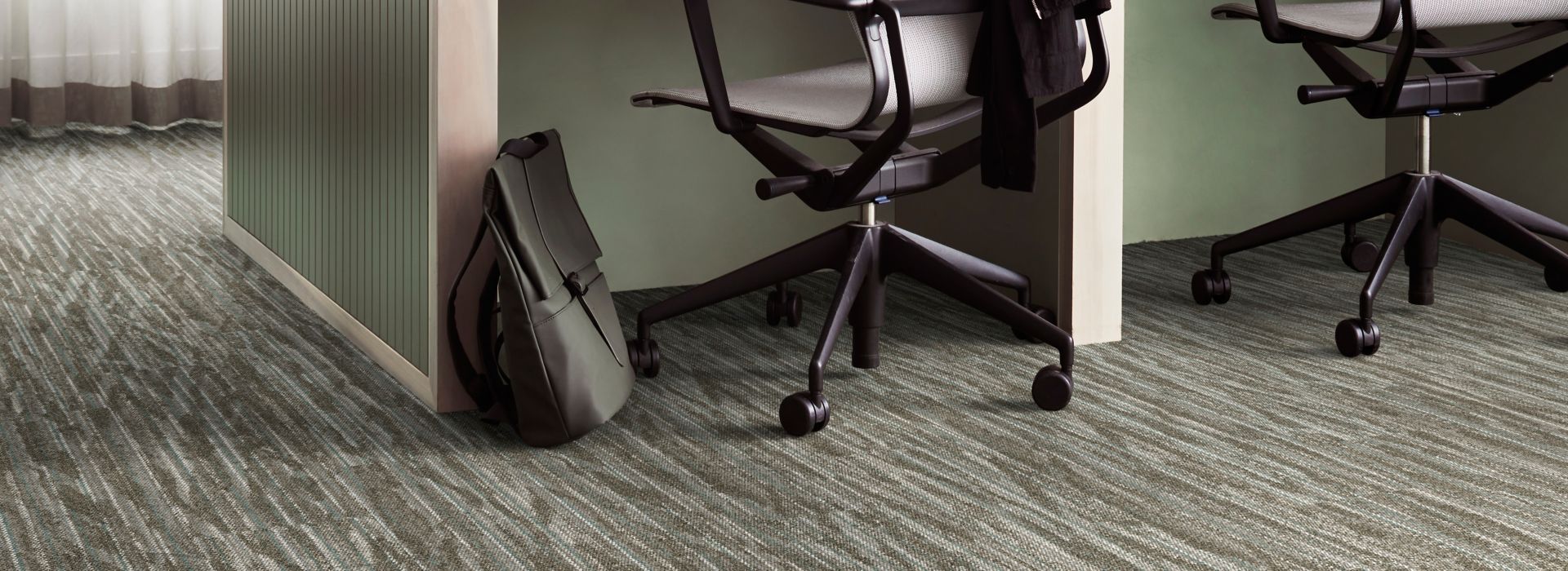 Interface Another Angle plank carpet tile in open office with woman walking