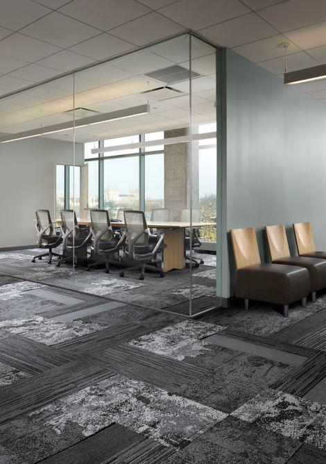 Interface B601, B602 and B602 carpet tile with B701, B702 and B703 plank carpet tile in private conference room and surrounding area