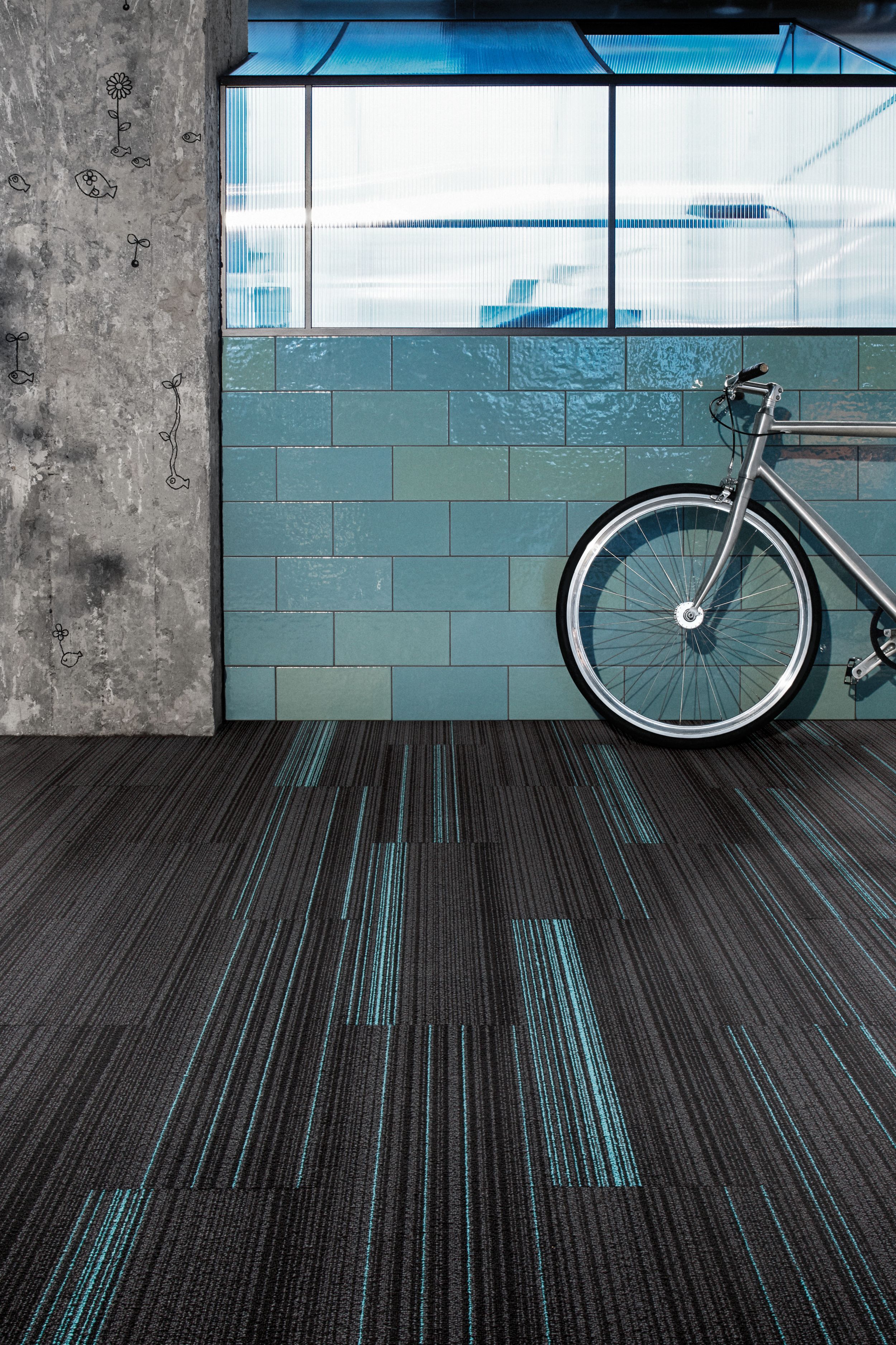 Interface BP410 and BP411 plank carpet tile in open space with bicycle and exposed brick wall image number 9