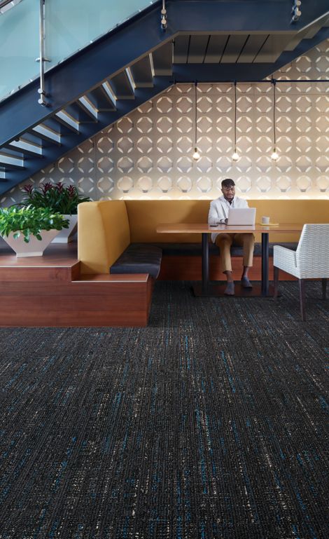 Interface Bitrate plank carpet tile in seating area with stairwell