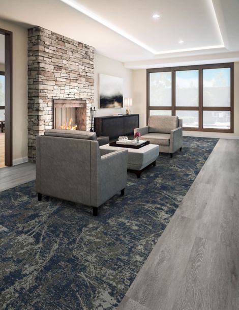 Interface Bouquet plank carpet tile and LVT in lobby seating area with fireplace