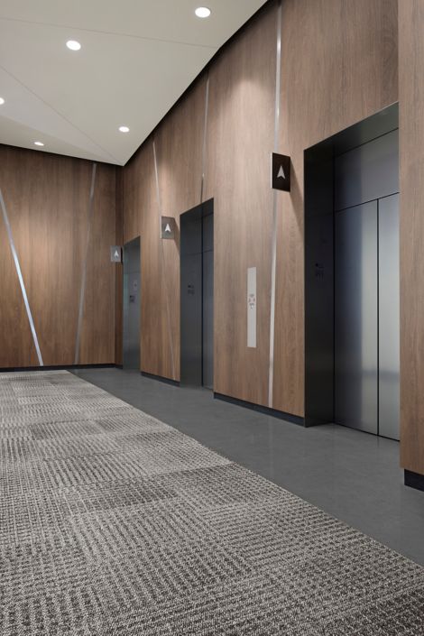 Interface Breakout carpet tile with Text Stones in lobby image number 5
