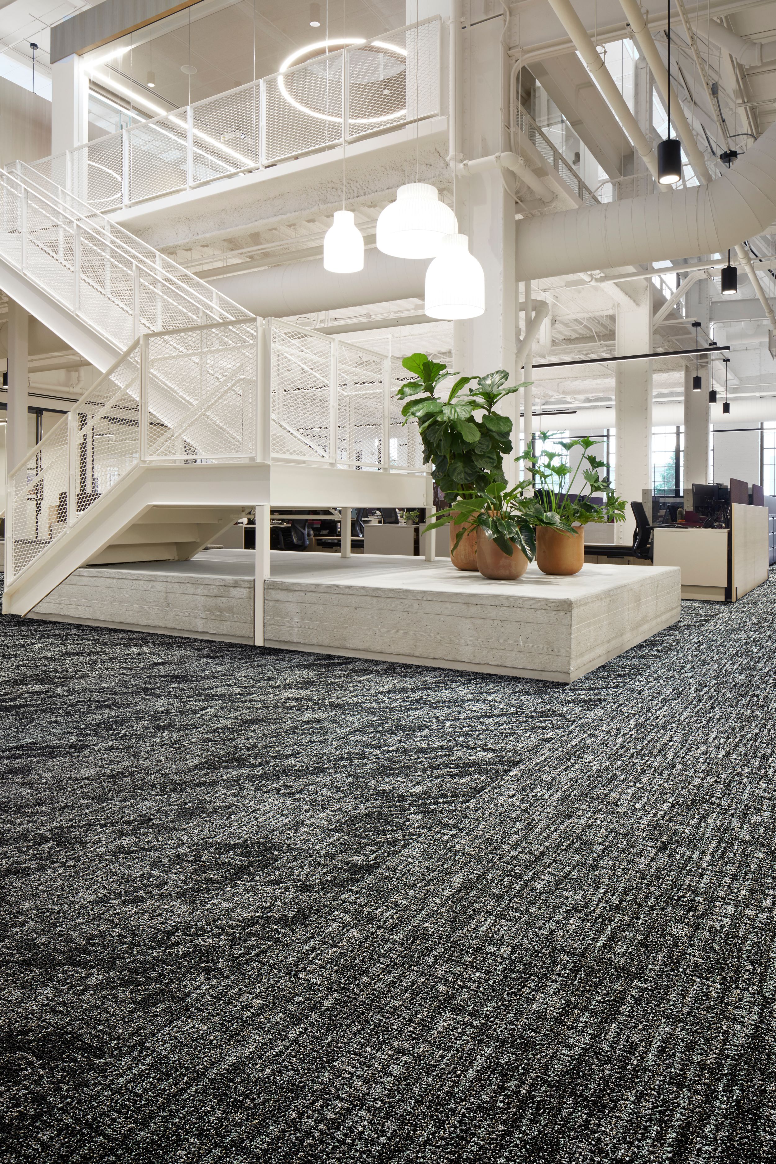 Interface C551 and C552 plank carpet tile in open area with stairs and workspaces image number 3