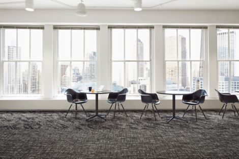 Interface C551 and C552 plank carpet tile in open area with cafe tables and large windows image number 3