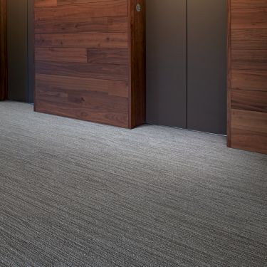 Interface CE171 plank carpet tile in elevator bank image number 1