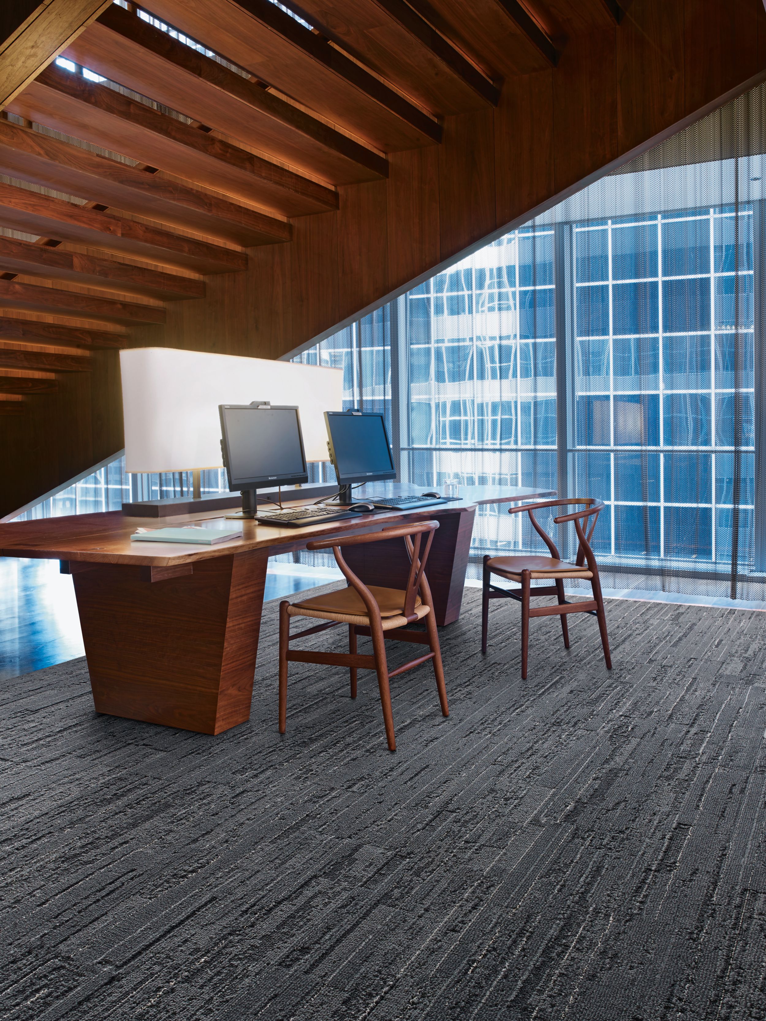 Interface CE172 plank carpet tile in office area with desk beneath stairwell image number 4