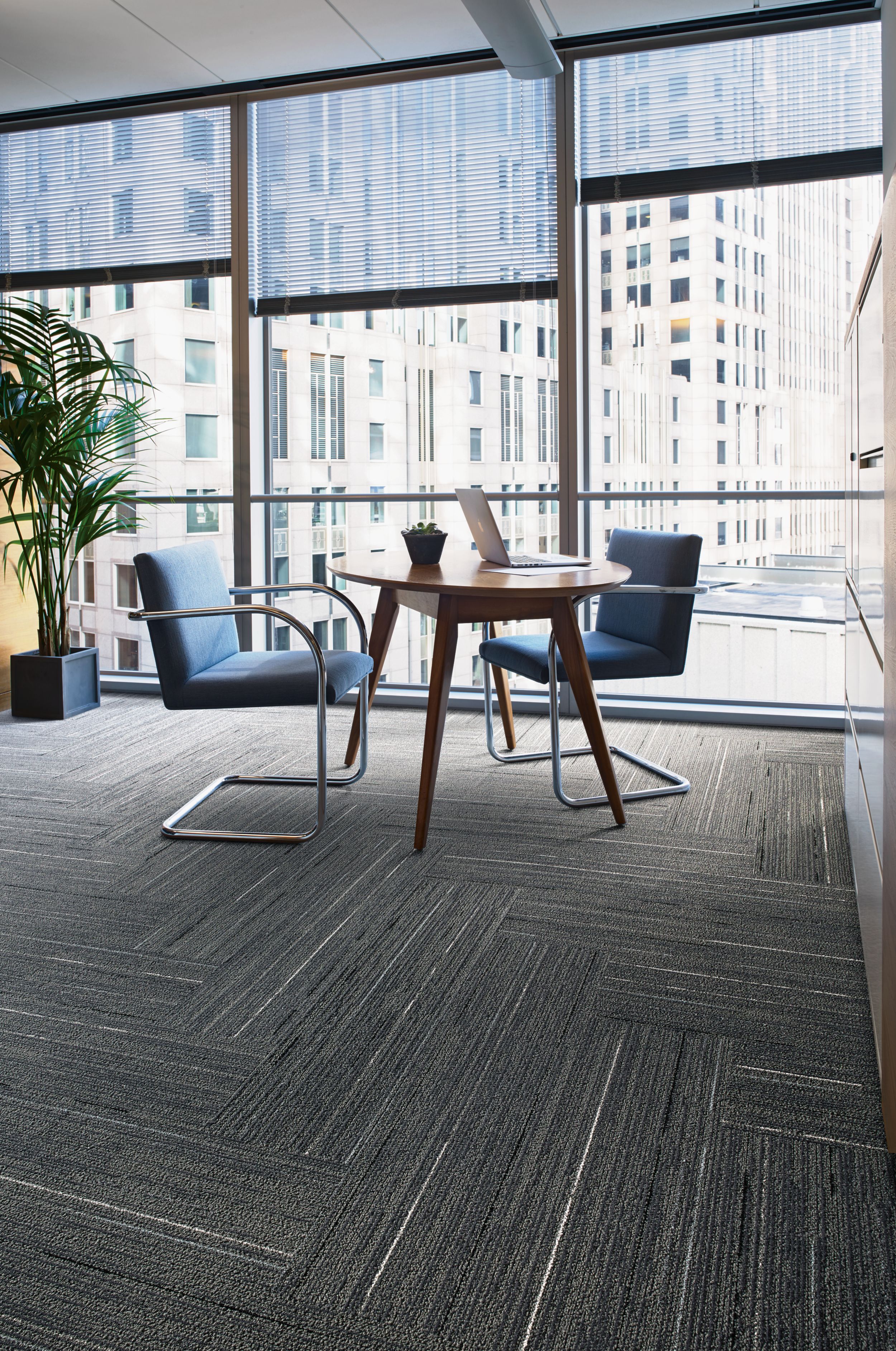 Interface CE172 plank carpet tile in office area with small table and chairs image number 6