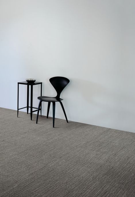 nterface CT102 carpet tile in corridor with chair and small table