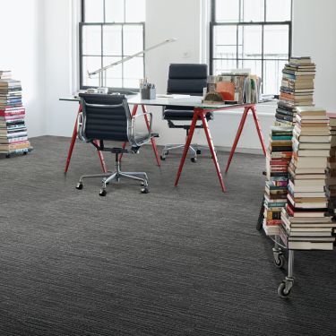 Interface CT102 carpet tile in private office with stacks of books image number 1