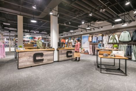 Interface Ice Breaker carpet tile in clothing shop with snowboarding and ski equipment image number 5