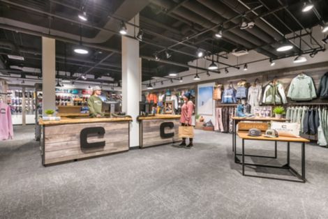 Interface Ice Breaker carpet tile in clothing shop with snowboarding and ski equipment image number 6