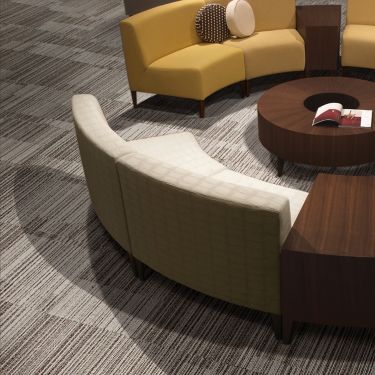 Interface Lima carpet tile with round booth couch and circular wooden table image number 1