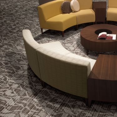 Interface Miramar Colores carpet tile with round bench seating and round wooden coffee table image number 1