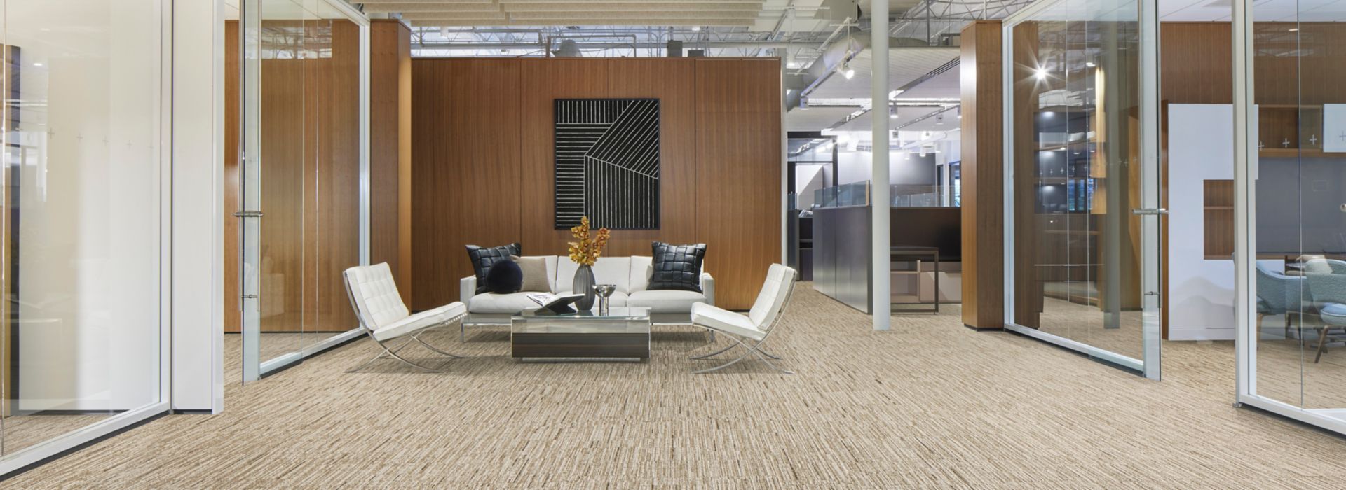 Interface Comes Around and Goes Around plank carpet tile in workplace lobby