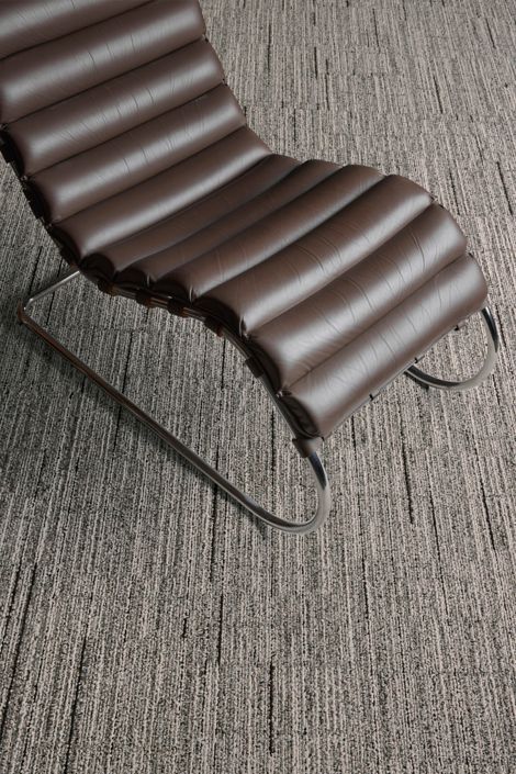 Interface Comes Around plank carpet tile in close-up with MR Lounge Chair image number 4