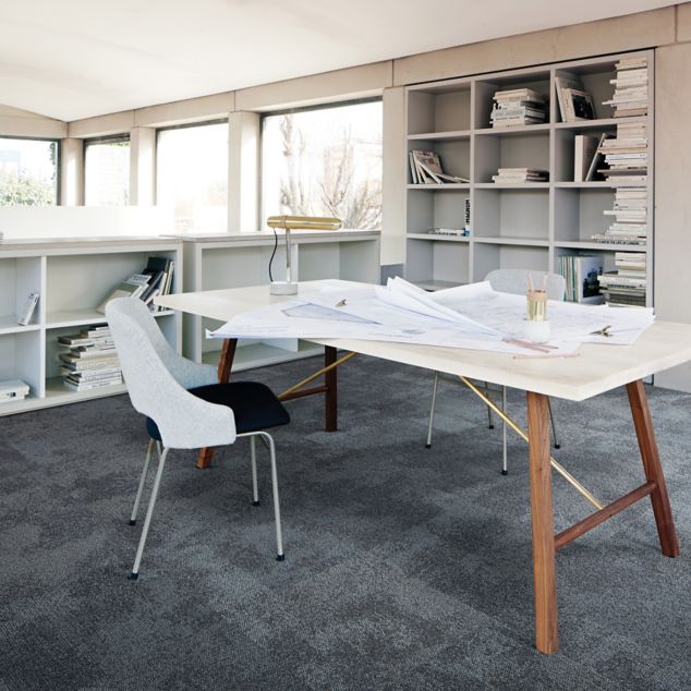 Interface Composure carpet tile with white table and architectural drawings