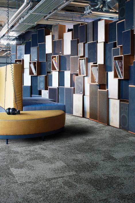 Interface Composure carpet tile with bench seat and speakers on wall