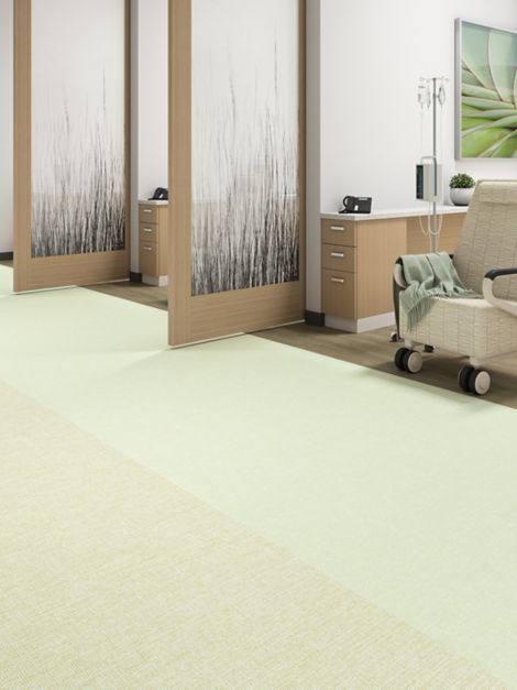 Interface Plant-astic LVT with Continual Woodgrains and Spike-tacular vinyl sheet in healthcare treatment area