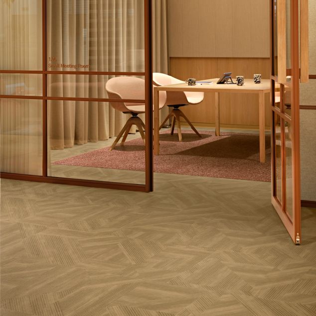 Interface Cut and Form LVT with Step It Up carpet tile in workplace meeting area and corridor