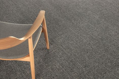 Detail image of Interface DL901 carpet tile with chair