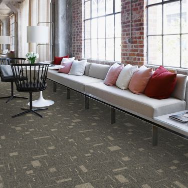 Interface DL903 carpet tile in public space with long couch