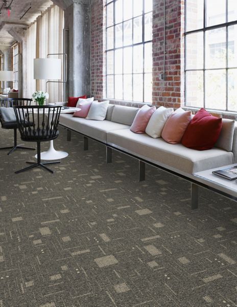 Interface DL903 carpet tile in public space with long couch