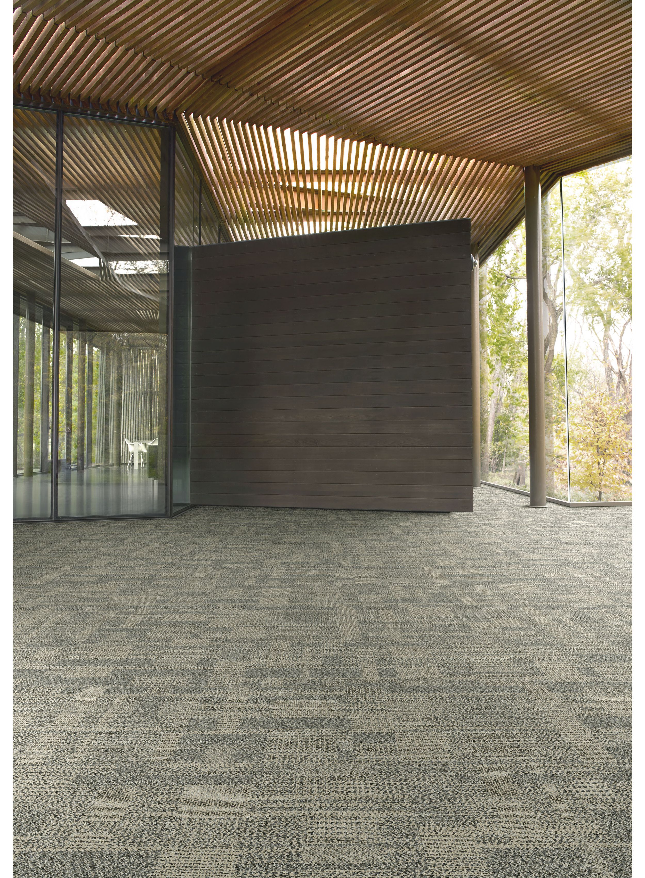 Interface DL923 carpet tile in open space with wood ceiling and wood accent wall image number 1