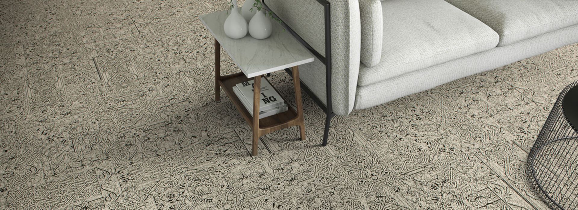 Detail of Interface DL924 carpet tile with couch and end table with vases