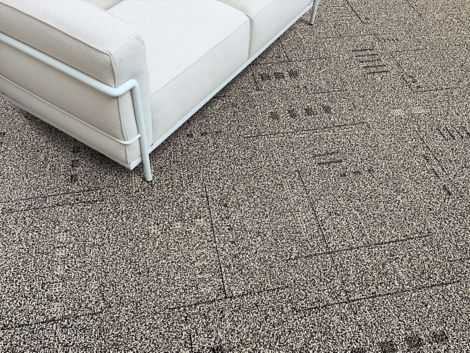 Detail image of DL927 carpet tile with white sofa