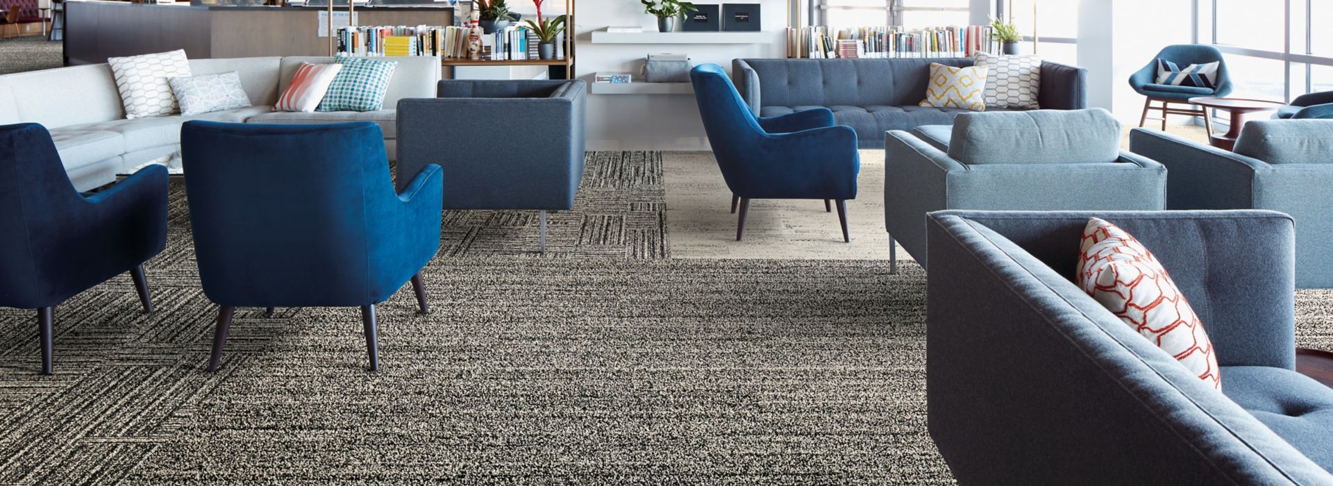 Interface Overedge plank carpet tile in open lounge area with chairs and couches image number 1