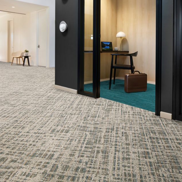 Interface Deckled plank carpet tile in corridor with WG100 carpet tile in  private workspace