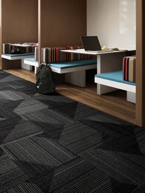Interface Detours Ahead carpet tile and Natural Woodgrains LVT in seating are with divided booths