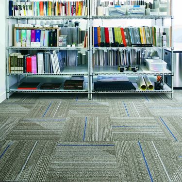 Interface Detours carpet tile in small area with bookshelves imagen número 1