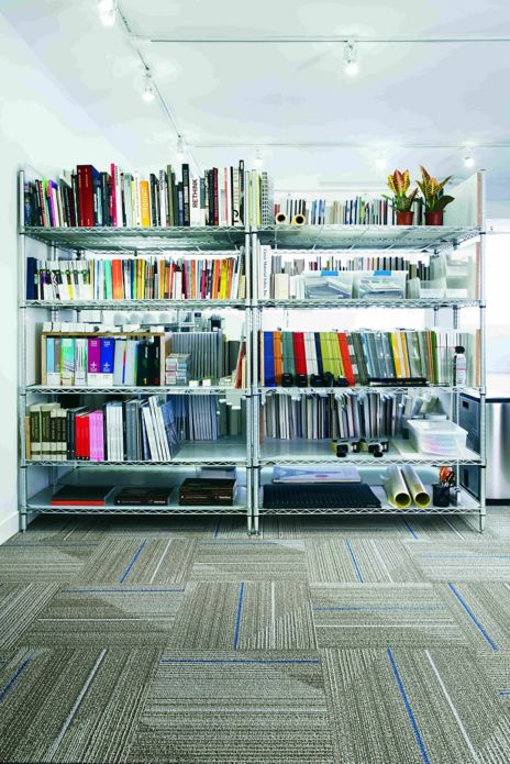 Interface Detours carpet tile in small area with bookshelves