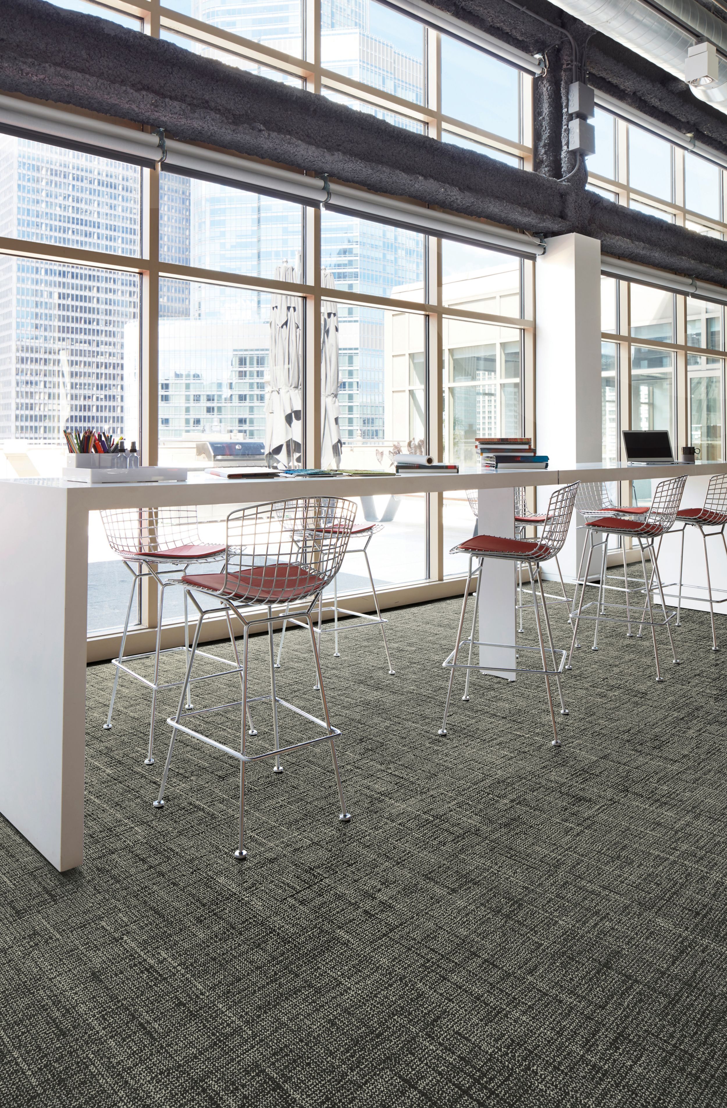 Interface Diminuendo plank carpet tile in seating area with glass windows image number 1
