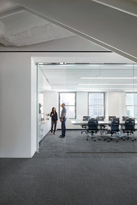 Interface Dover Street and Mercer Street carpet tile in open meeting room with glass doors