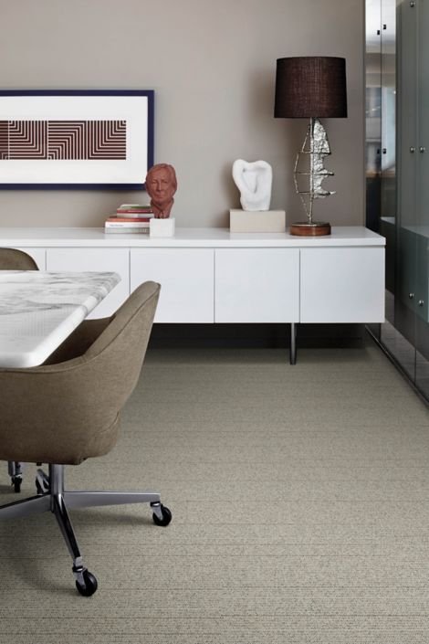 Interface Drawn Thread plank carpet tile in small enclosed room with table and chairs