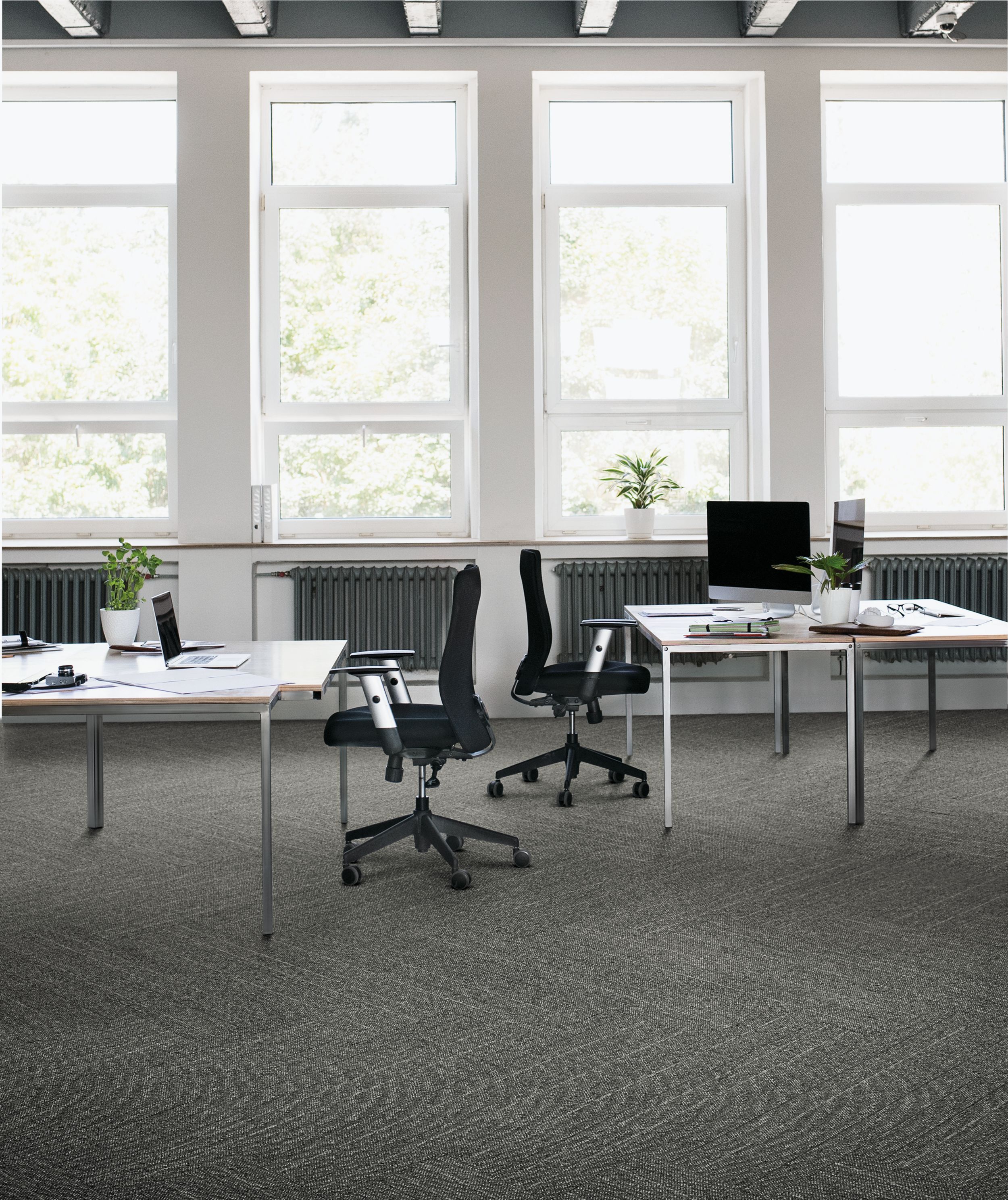 Interface Drawn Thread plank carpet tile in open work area with two desks and chairs image number 1
