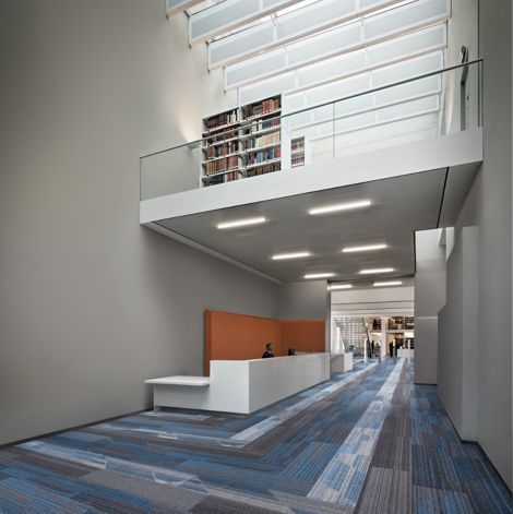 Interface Driftwood and Shiver Me Timbers plank carpet tile in recpetionist area of library