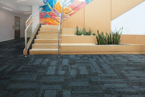 Interface Dynamic Duo carpet tile in entryway with stairs 