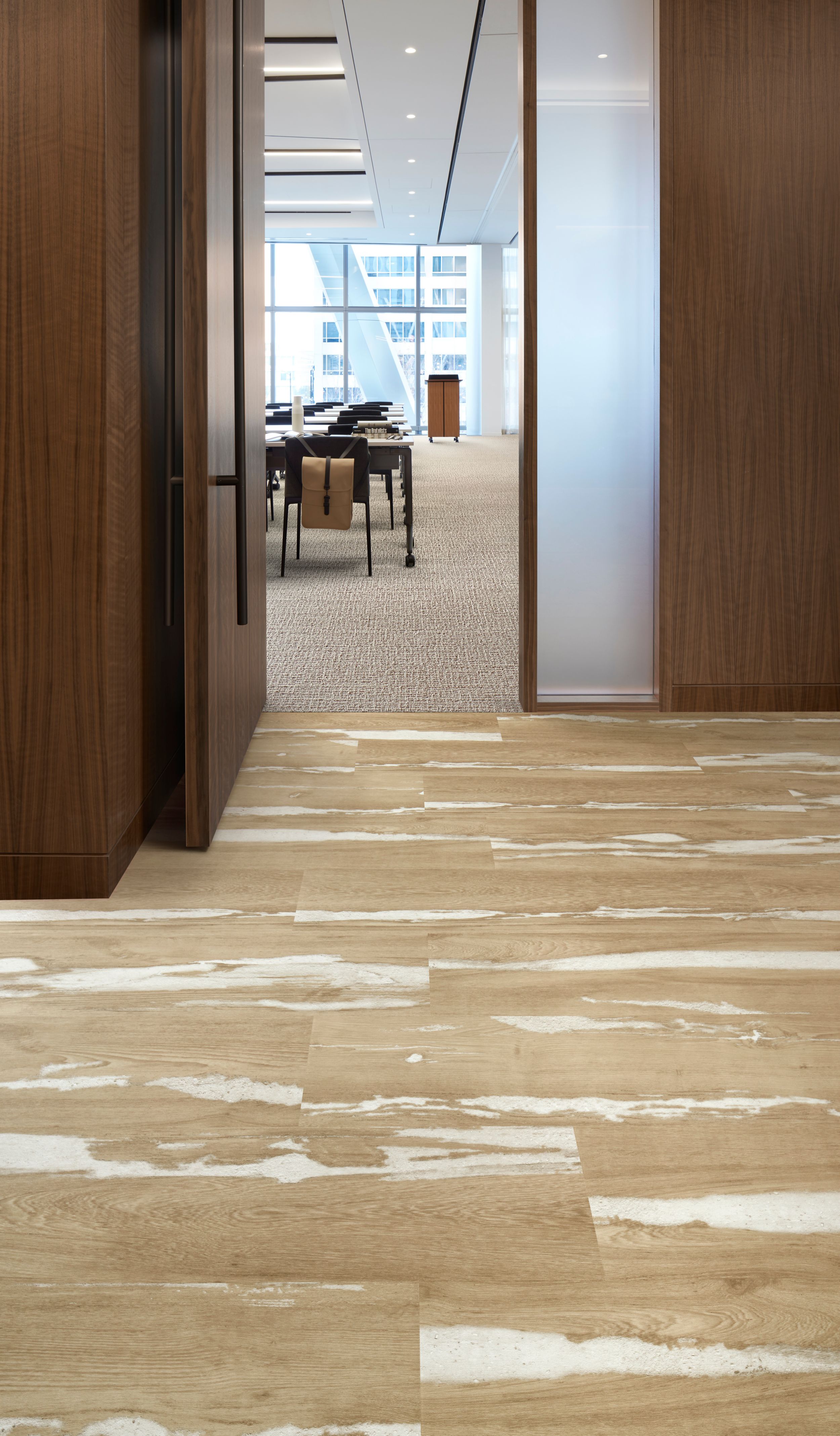 Interface Crossroads plank LVT with E616 plank carpet tile in corporate corridor and meeitng room image number 2