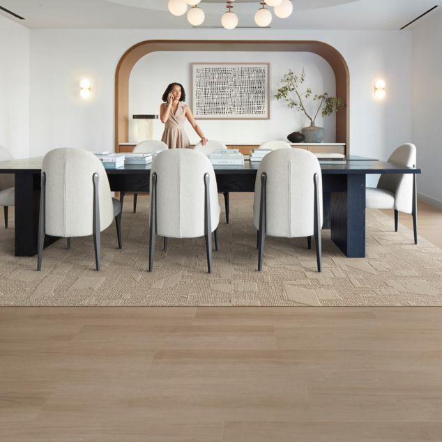 Interface On Grain plank LVt with E612 plank carpet tile in corporate meeting room