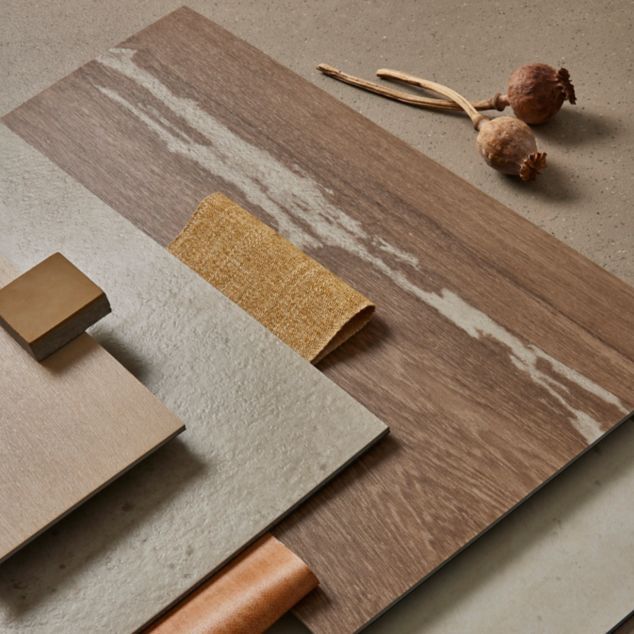 Tabletop palette of Interface Earthen Form LVT with norament castello rubber