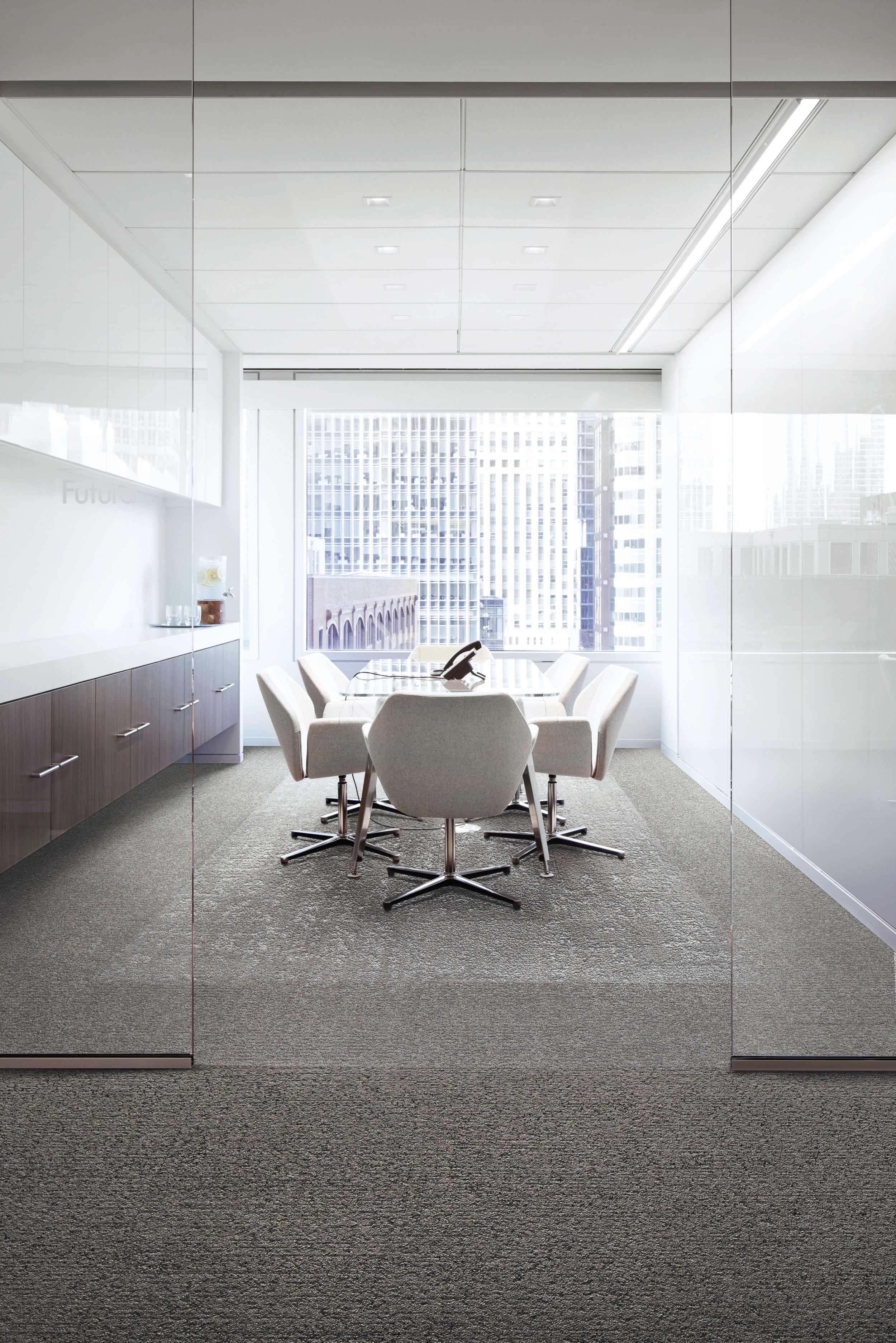 Interface Edge, Shed and Riverwalk carpet tiles in meeting room with glass door and office buildings in background window image number 4