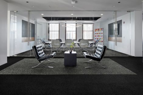 Interface Edge, Vessel and Riverwalk in waiting area with black leather chairs and meeting room in background